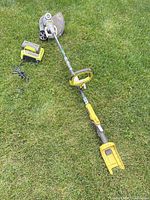 Full view of Ryobi 40V string trimmer with battery and charger