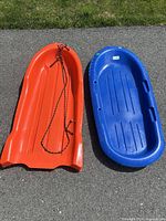 Top view of both sleds showing overall design, colors and condition