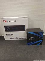 Front view of both sealed retail boxes