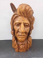 Front view of carved chief bust