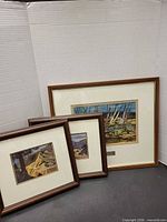 All three framed landscape prints grouped