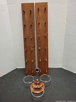 Full view of two peg racks and condiment caddy