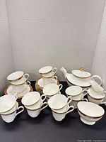 Group view of Sandon cups, saucers, Tennyson teapot