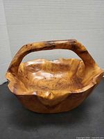 Top angled view showing interior grain and handle