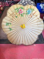Full view of hand-painted rice paper parasol