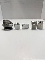 front view of all five lighters in a row