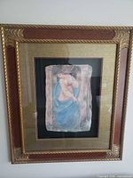 Entire framed artwork hung on wall