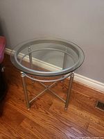 Oblique view showing glass top and metal frame
