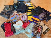 Full assortment of costumes, hats, props laid out