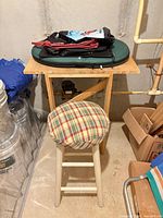 Stool, table with stadium seat and tote bags
