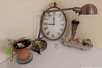 All four items together: copper desk lamp, clock, potted plant, decorative tray