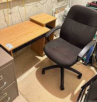 Desk and chair together showing overall lot