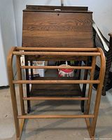 Front view of secretary desk with rack placed in front