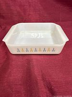 Overall view of square baking dish showing Candle Glow pattern