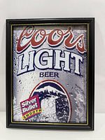 Front view of framed Coors Light poster