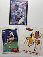 Fronts of three Greg Maddux baseball cards – Donruss, Topps, Score
