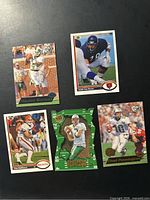All five football cards laid out