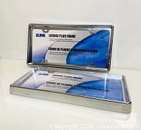 Front view of two sealed chrome iLink license plate frames