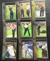 Front view of nine Tiger's Tales Tiger Woods Upper Deck cards