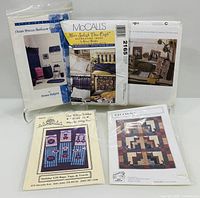Front view of five pattern envelopes showing all titles and images