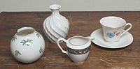 All five Lenox pieces on table