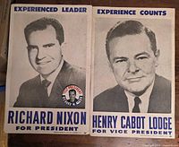 Front view of both campaign posters with button attached