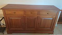 Front view showing entire buffet with drawers and doors