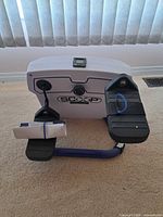 Front view showing SCOOP logo, pedals, manual attached