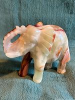 Front angled view of banded onyx elephant