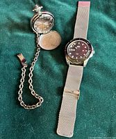 Both watches side by side showing overall design and materials