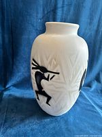 Full view of vase showing Kokopelli figure and geometric background
