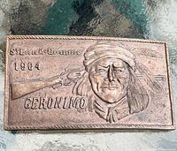 Front view showing Geronimo relief, text, rifle motif