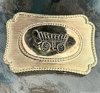 Front view showing covered wagon design and beaded border