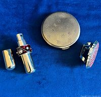All three vanity items side by side on blue background