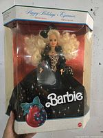 Front view of boxed Happy Holidays Barbie doll
