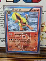 Front of Flareon card in holder