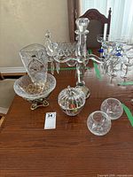 Group shot showing candelabra, vase, pedestal bowl, apple box, crackle votives and stemware
