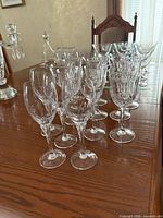 Group shot of all crystal wine and cordial glasses on table
