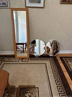 All three mirrors displayed together against wall