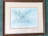 Front view of framed watercolor landscape showing artwork, mat and frame