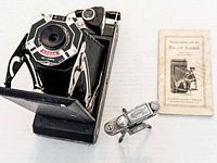 Camera, tripod, and booklet overview