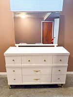 Front view of dresser with attached mirror