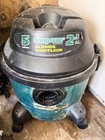 Front view of Shop-Vac showing logo and capacity