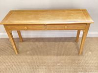 Full front view of light brown veneer console table
