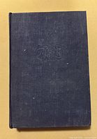 Front cover of dark blue cloth hardcover