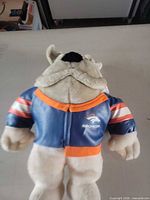 Back view plush bulldog showing jacket details