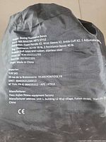 Black carrying bag with printed product specifications