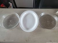 All three platters: two clear round, one white oval