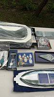 Group shot of all five items including platter, crystal bowl, stopper, shaker set, decorative plate