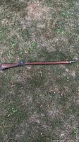 Full view of toy rifle showing overall length and form